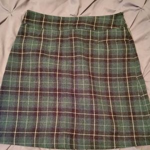 Morena green, navy, black & white plaid skirt.